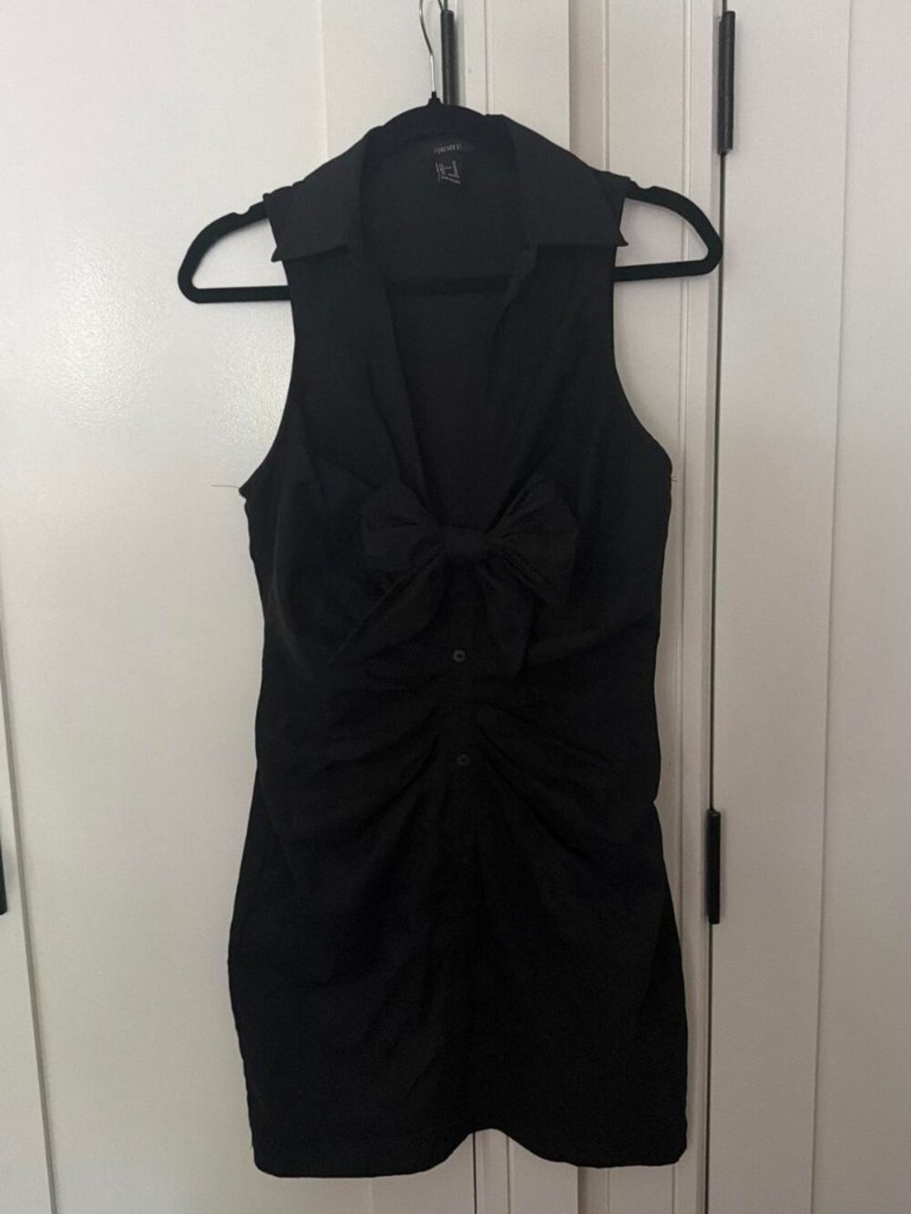 Black mini dress with bow detail